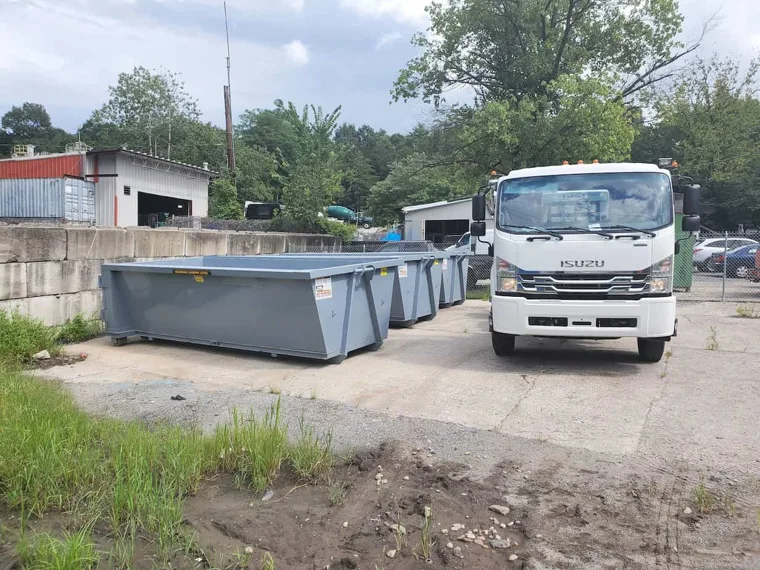 Roll Off On The Go truck and roll off containers